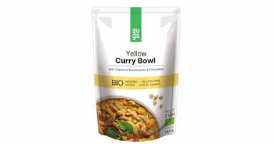 Organic yellow curry stew with champignons and chickpeas