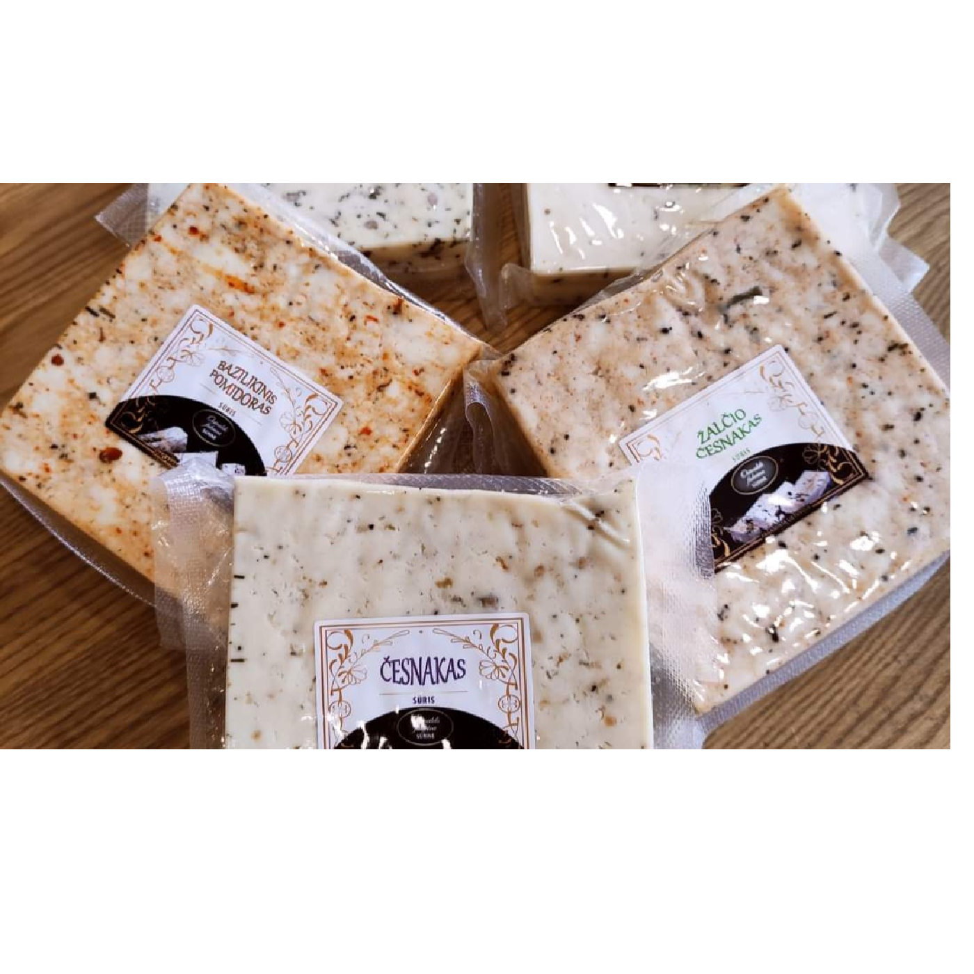 Sweet milk cheese with garlic and herbs 22% rieb. ~300-400g